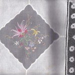 Army Navy Linen tablecloth with Organdy inserts of needlework Chrysanthemums.