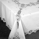 This beautiful hand made bobbin lace tablecloth is an heirloom treasure. Full Lace edge on all sides of the tablecloth. The hand embroidered details provide added value and interest to behold