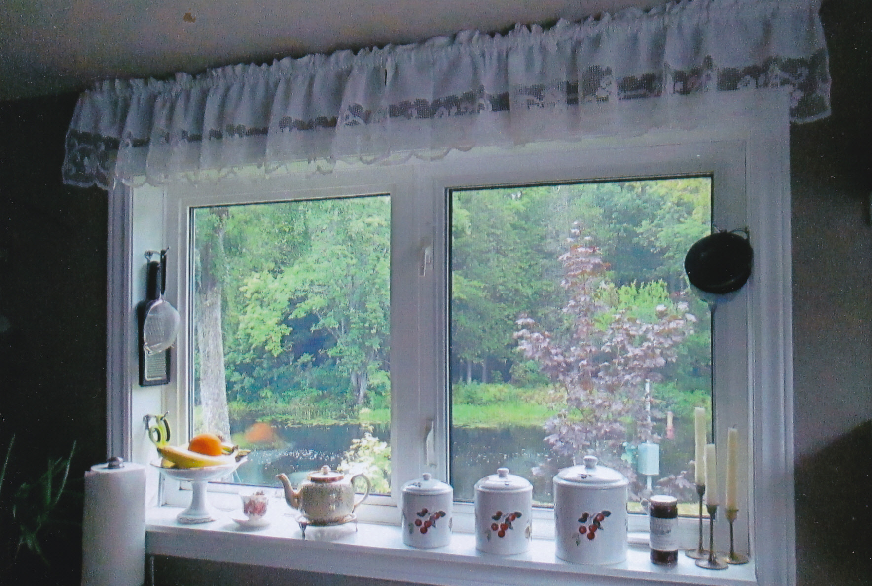 "Elevate small windows with Hand-Knotted Tuscany Lace Valances featuring a charming Rose pattern trim, perfect for kitchens or windows above doors."