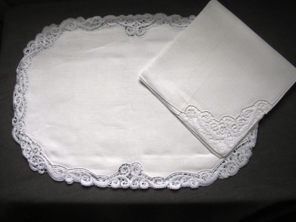 "Ideal for upscale dining, delicate Flat Venice Lace design features picoted rings on imported Irish flax linen. Timeless elegance."