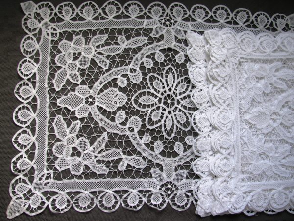 "Experience the intricate beauty of Flat Venice Lace, meticulously hand-stitched with needle and thread. Available in two sizes: 12"x18" or 14"x20"."