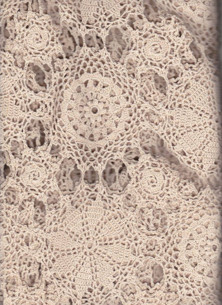Ecru Snowflake Crochet BedCover featuring intricate circular patterns in Ecru, set against a blue backdrop, with its design showcasing repeated alternate motifs for a delicate, elegant texture.