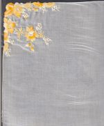 Satin-stitch daffodil handkerchief with tiny embroidered white flowers