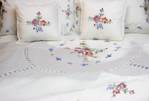 Cross Stitched Embroidered with crochet lace inserts bedding ensemble