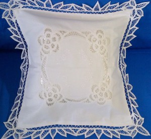 Elite Battenburg Lace square pillow with full lace trim edge and satin-stitched embroidery.