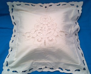 Pure Cotton cutwork roses motif pillow with cutwork trim edge.