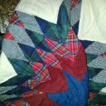 Hand quilted Tartan Lone Star in Ecru Cotton Flannel, available in a lap quilt or throw size.