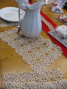 Vienna Crochet Lace runner- Inspired by the Celtic Knot symbol- beautifully designed to reflect a contemporary setting rooted in ancient culture. Imagine the rich ecru tone on a black contemporary coffee table.