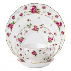 Royal Albert "New Country Rose" cross-stitched tablecloth is a perfect compliment to the beautiful china dishes. The crisp white cotton with vibrant colours.