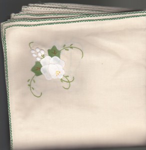 Hand Appliqué White Heritage Roses with green foliage dinner size napkins.