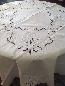 Cutwork Rose Round tablecloth is a ready made element for that designer's look for the bedside table.