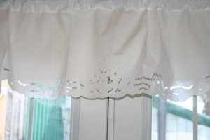 Pristine White Cutwork embroidered Roses Cotton valance will sure to enhance any decor.