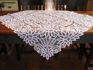 Hand crafted collectibles : Battenburg Sunflower all over lace tablecloth with brides & bars spider webs & lace rings.