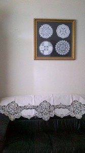 Ecru Battenburg lace Window Pane style valance as a sofa back cover,