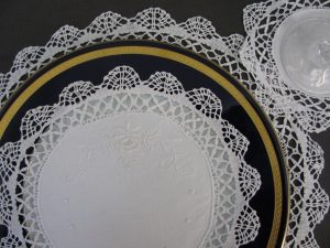 Hand made Cluny Lace with Satin Stitches hand embroidered details in doily and runners. Natural fibre cotton rich fabric.