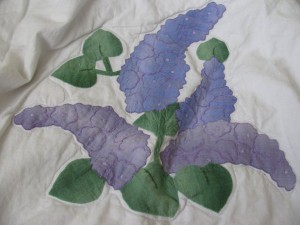 Applique Purple Lupins Botanical Garden Quilt with embroidered flower petals.