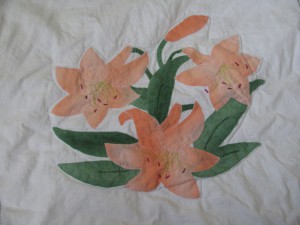 Applique Orange Day Lilies Botanical Garden Quilt with embroidered flower petals.