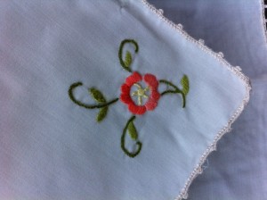 Basket of Roses is hand embroidered with a beautiful Crochet Lace edge. Easy care Cotton & Polyester blend.