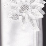 Crisp White Cotton Napkins with an exquisite Battenburg Sunflower Lace corner is a wonderful hostess gift during the holidays. The napkin is very well finished with a lace binding straight at the edge. Package of 6.