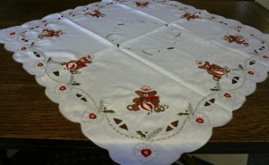 Beary Christmas with fun loving Teddy Bear motif on easy care white embossed fabric.
