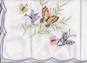 Butterflies are embroidered on cotton & polyester blend kitchen size table for 6.