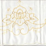 An old time favourite- Regal peony- in Canary Yellow colour of Cutwork Embroidery on Natural Fibre Cotton Rich pillow cases. Canary Yellow colour Embroidery on White. Queen size.