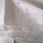 Fine crochet lace trim on the front & back of the pillow case.