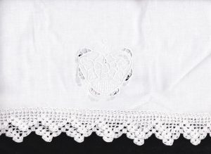 White Queen of Hearts Embroidered Guest towel features a full hand crocheted lace edge in a ladder pattern
