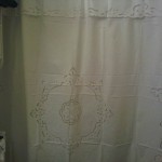 White Cotton Cutwork Rose shower curtain is beautifully embroidered on all sides. Detachable valance.