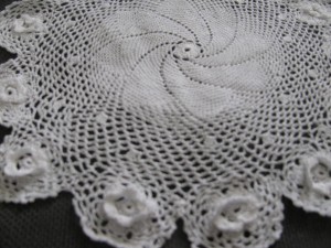 Fine Pinwheel Crochet Doilies with Irish Roses edge and border.