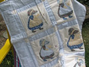 Sun Bonnet Sue or Dutch Girl baby quilt with embroidered 