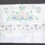 Cutwork & Embroidered Lingerie Bag is satin-lined and provides an elegant way to organize anything from delicate under garments to important keepsakes while traveling in style. Approximate size: 26x15"