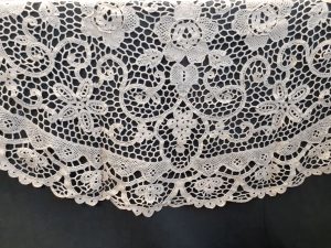 The designer of this piece produced an imaginative tablecloth combining five different crochet stitches. Imitating Italian Needlepoint Lace in a faster and easier crochet lace method.