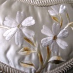 Satin Embroidered Floral Heart Pillow in Natural shade for a tranquil home.