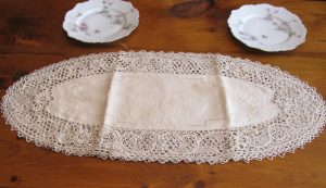 Pure Linen Reticella Lace place mat doily in Ecru colour with hand embroidered decoration.