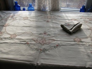 Peaches and Cream luncheon tablecloth with Punchwork and embroidery; Easy care cotton/polyester blend.