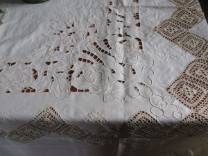 Luxurious Cutwork Elegance tablecloth with Crocheted Chevrons for formal dining.