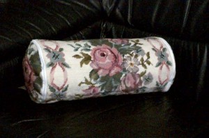 Roses and Ribbons woolen needlepoint neck roll.