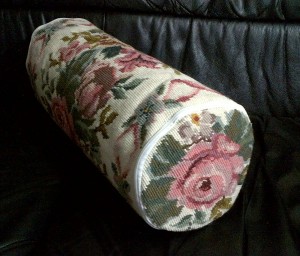 Roses and Ribbons woolen needlepoint neck roll.