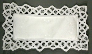 Battenburg Lace tank cover for the bathroom with lace edge and hand embroidered accent details.