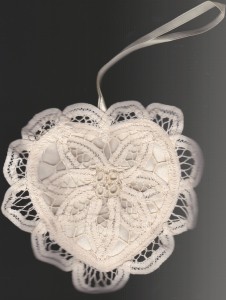 Imagine the scent of pine or Christmas potpourri to fill the home this holiday season in a heart sachet hanging as a tree ornament.