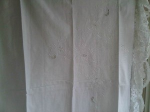 Tuscany Lace full edge border with hand stitched flowers of the bedding product line