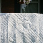 Heirloom quality Wedding quilt with Italian Trapunto Wedding Doves and Irish Claddagh Ring accents. 