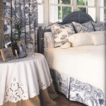 Cutwork tablecloth matching duvet cover can create a designer's coordinated element.
