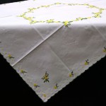 Yellow Blooms embroidered table topper for Easter or spring/summer.