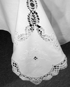 A Touch of Cluny Lace is simple elegance with hand embroidered heart shaped flower accent cotton tablecloth.